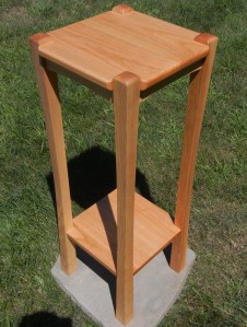tall wooden vase stand
